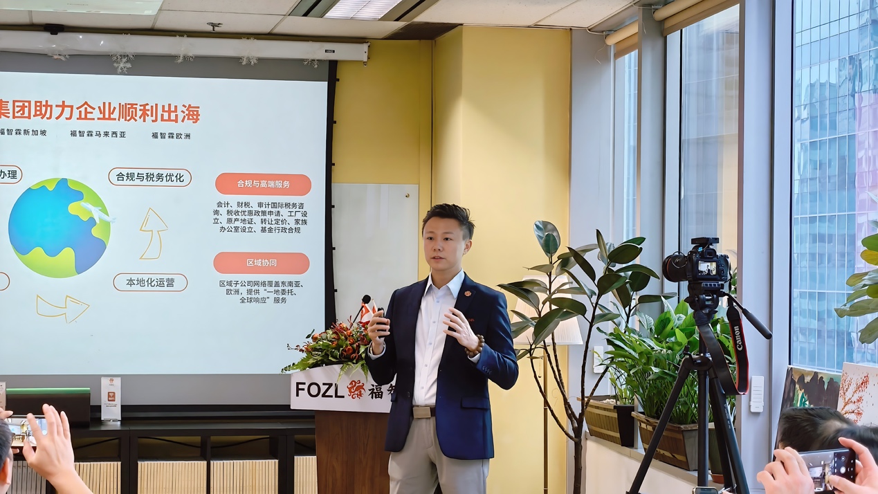 A person standing in front of a screen AI-generated content may be incorrect.