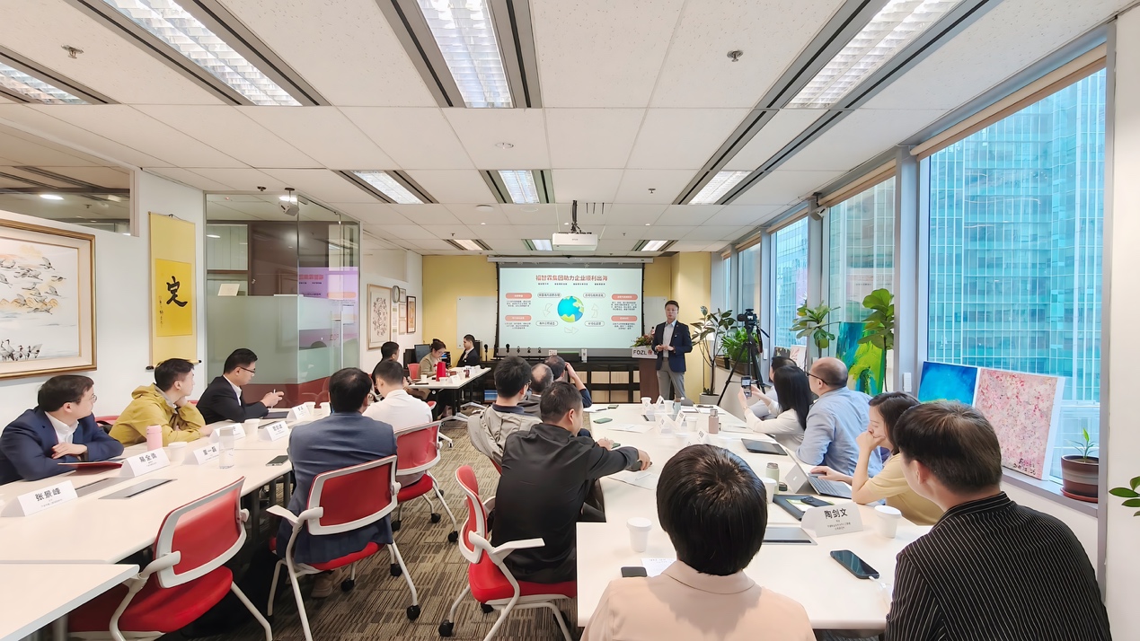 A group of people sitting at tables in a room AI-generated content may be incorrect.