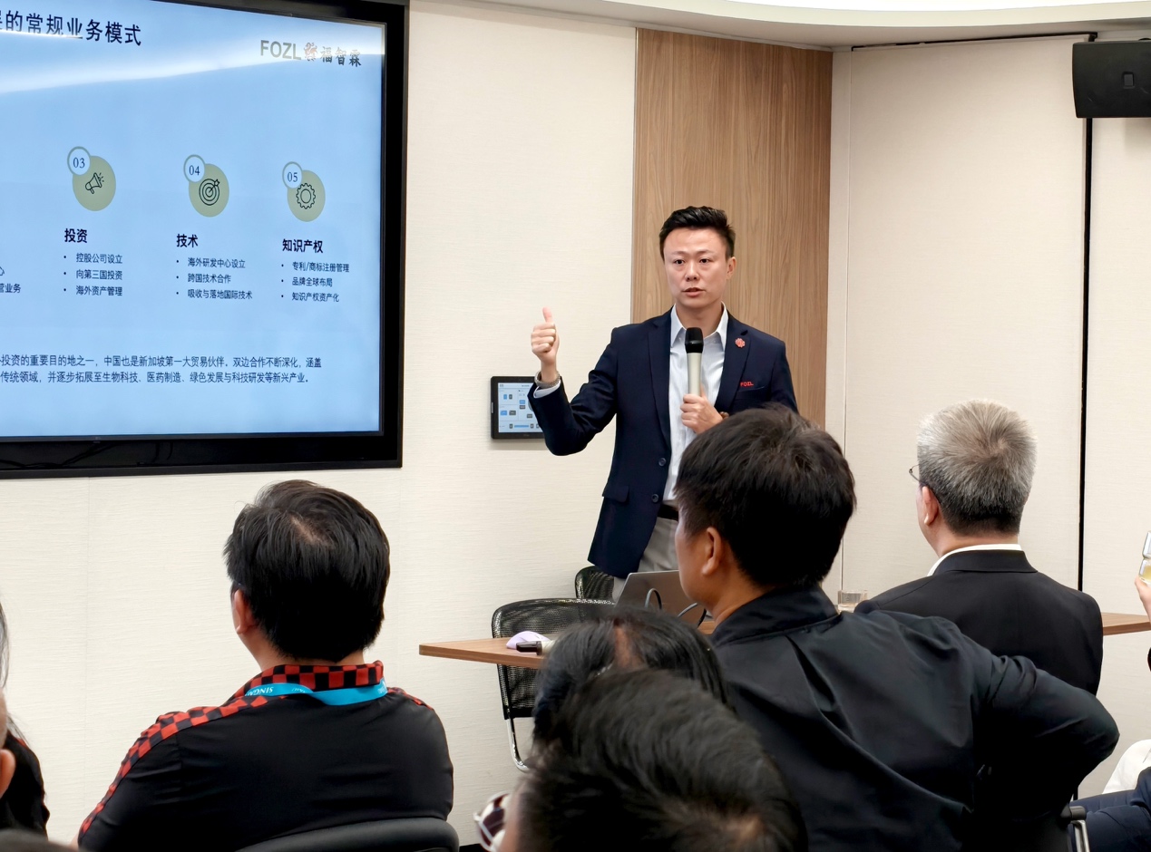 A person giving a presentation to a group of people AI-generated content may be incorrect.